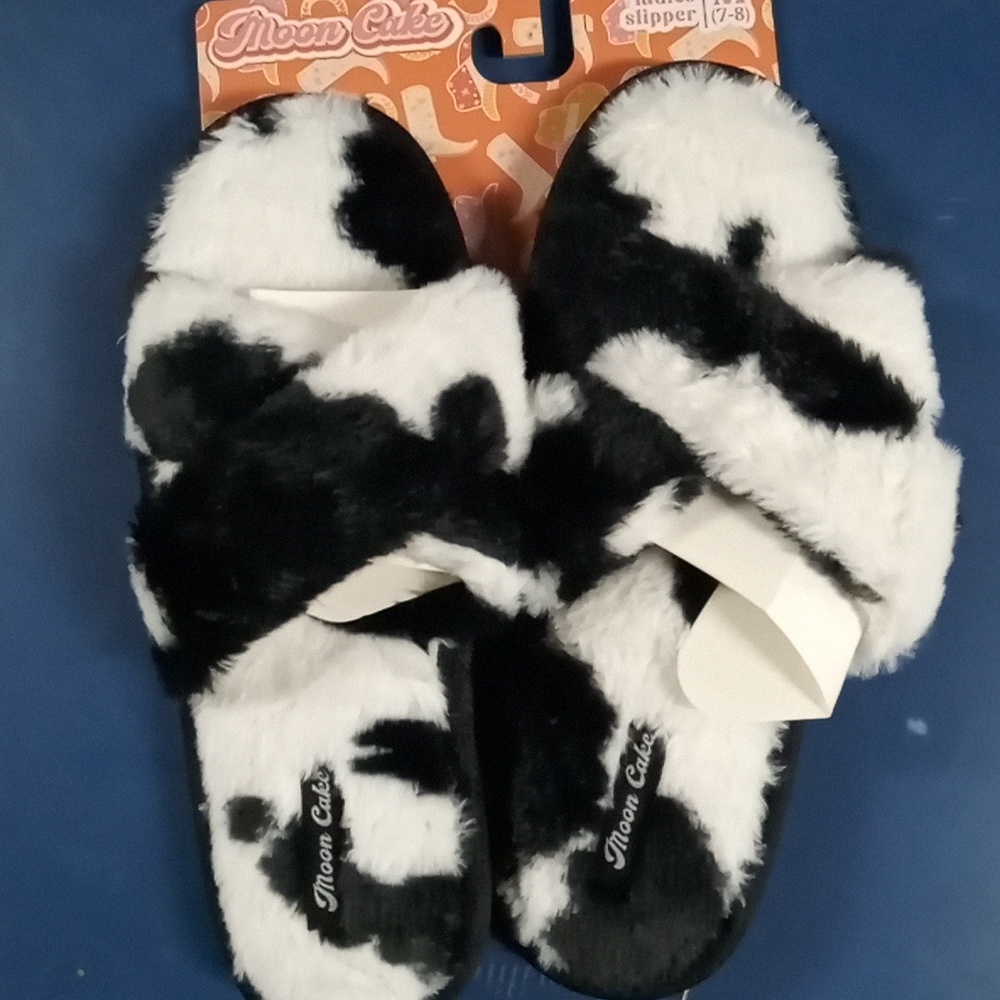 Cow print house slippers by mooncake